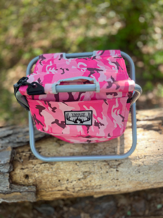 Pink Camouflage folding cooler/coozie chair is light weight and perfect for the dove field or a day of fishing. Two side compartments for storage and deep pocket cooler.